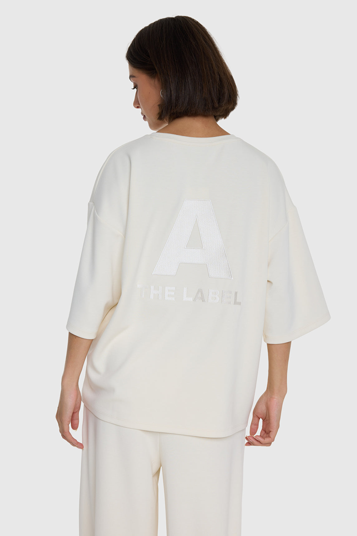 Alix The Label SCUBA V-NECK TOP